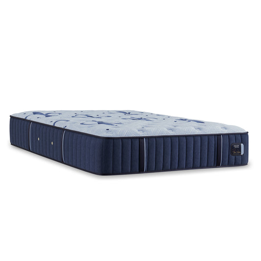 Blue mattress with floral pattern on a white background